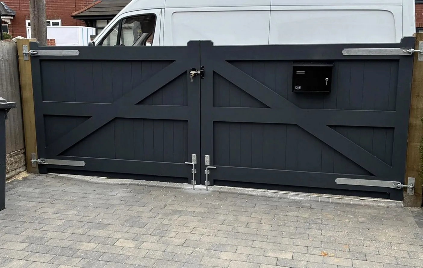 Steel single-leaf entry gate installed for residential property in DuPage County